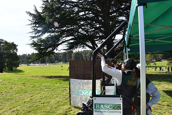 BASC shotgun coach with a student